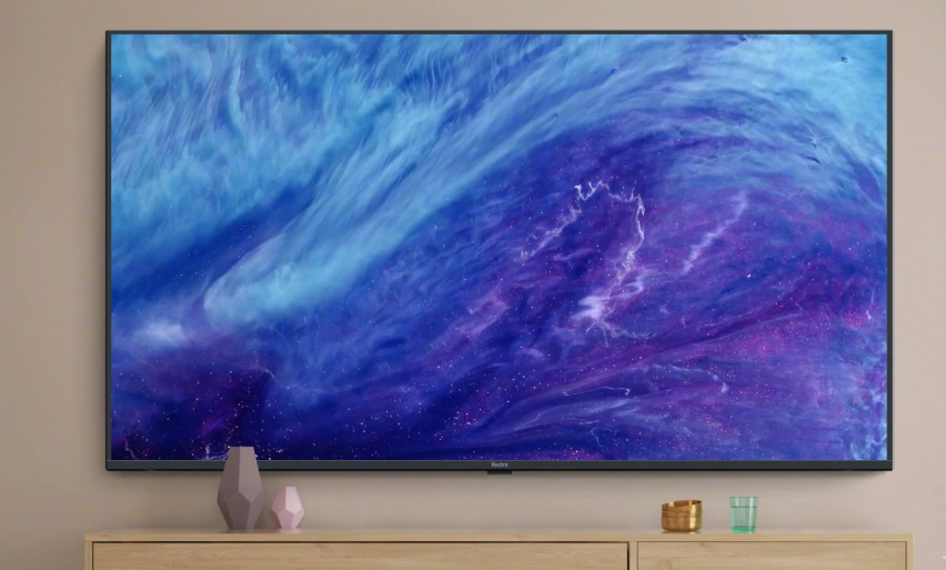 With 4K HDR Screen, Quad-Core SoC Launched Read in: हिंदी বাংলা தமிழ் Redmi TV price has been set at CNY 3,799 (roughly Rs. 38,000). By Gaurav Shukla | Updated: 29 August 2019 18:38 IST Redmi TV 70 With 4K HDR Screen, Quad-Core SoC Launched Redmi TV supports Dolby Audio and DTS HD audio technologies HIGHLIGHTS Redmi TV 70 will go on sale beginning September 3 There is no word on its launch outside China right now Xiaomi already sells almost two dozen smart TVs in China JUMP TO Redmi TV 70 price, sale date Redmi TV 70 features, specifications IN THIS ARTICLE Redmi TV 70 Redmi TV is here. Xiaomi on Thursday unveiled the first Redmi-branded smart TV in China at an event in Beijing. It will join the various Mi TV models in the company's home entertainment portfolio. Xiaomi is only releasing the 70-inch model of the Redmi TV initially and it will be simply called Redmi TV 70. It comes with features like 4K resolution, HDR support, quad-core processor, and PatchWall interface. In addition to the Redmi TV, Xiaomi's Redmi brand at the event showcased its new Redmi Note 8 and Redmi Note 8 Pro smartphones as well as the refreshed RedmiBook 14 laptop. "Redmi TV 70” offers 4K and sports a minimalist design. With a viewing area 60% larger than 55-inch screens, Redmi TV 70” offers an ultimate immersive viewing experience," Xiaomi wrote in a blog post. Redmi TV 70 price, sale date Xiaomi says the Redmi TV 70 will go on sale in China beginning September 10, however the pre-orders open August 29. It will carry a price tag of CNY 3,799 (roughly Rs. 38,000). There is no word on the international availability of the television at this point, however as Xiaomi brought its Mi TV devices to countries like India, the Redmi TV should also make its way outside China sooner or later. Redmi Note 8, Redmi Note 8 Pro With Quad Rear Cameras Launched Redmi TV 70 features, specifications As mentioned, Redmi TV features a 70-inch 4K screen with HDR support. It sports a fairly simple design with bare-minimum bezels and can be wall-mounted or put on a tabletop. The Redmi TV runs on the company's PatchWall platform. There is a quad-core 64-bit Amlogic SoC at the core, paired with 2GB of RAM and 16GB of onboard storage. Additionally, the Redmi TV supports various audio technologies such as Dolby Audio and DTS HD. Among the connectivity options, you will get dual-band Wi-Fi, Bluetooth 4.2, two USB ports, three HDMI ports, AV input, and more. The company will also be bundling the Bluetooth-powered voice remote with the Redmi TV 70. To recall, Xiaomi currently offers as many as 22 smart TV models as a part of its Mi TV lineup in China right now, alongside the Mi Box streaming device. Redmi TV 70 Redmi TV 70 KEY SPECS NEWS Display 70.00-inch Resolution Ultra HD (4K) OS Android Based Touchscreen No Smart TV Yes Also See Mi 4C Pro 32 Inches HD Ready LED TV (L32M5-AN, Black) ₹12,499 Mi 4A Pro 49 Inches Full HD LED TV (L49M5-AN, Black) ₹29,999 TCL 107.86 cm (43 inches) Full HD LED Certified Android Smart TV P30 43P30FS (Black) ₹33,990 3 COMMENTS For the latest tech news and reviews, follow Gadgets 360 on Twitter, Facebook, and subscribe to our YouTube channel. Further reading: Redmi TV 70 inch, Redmi TV, Xiaomi, Redmi Gaurav Shukla Email Gaurav Paranoid about online surveillance, Gaurav believes an artificial general intelligence is one day going to take over the world, or maybe not. He is a big ‘Person of Interest’ fan. More Samsung Galaxy Home Mini Smart Speaker Beta Program Goes Live in South Korea, Could Be Launched Soon RedmiBook 14 Pro Powered by 10th Gen Intel CPU Launched, Two New Colour Options in Tow Tech News : NDTV Gadgets360.com Redmi TV 70 With 4K HDR Screen, Quad-Core SoC Launched ADVERTISEMENT